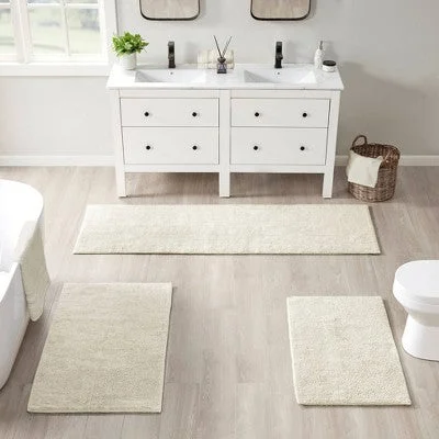 24"x72" Plume Feather Touch Reversible Bath Rug Ivory - Beautyrest